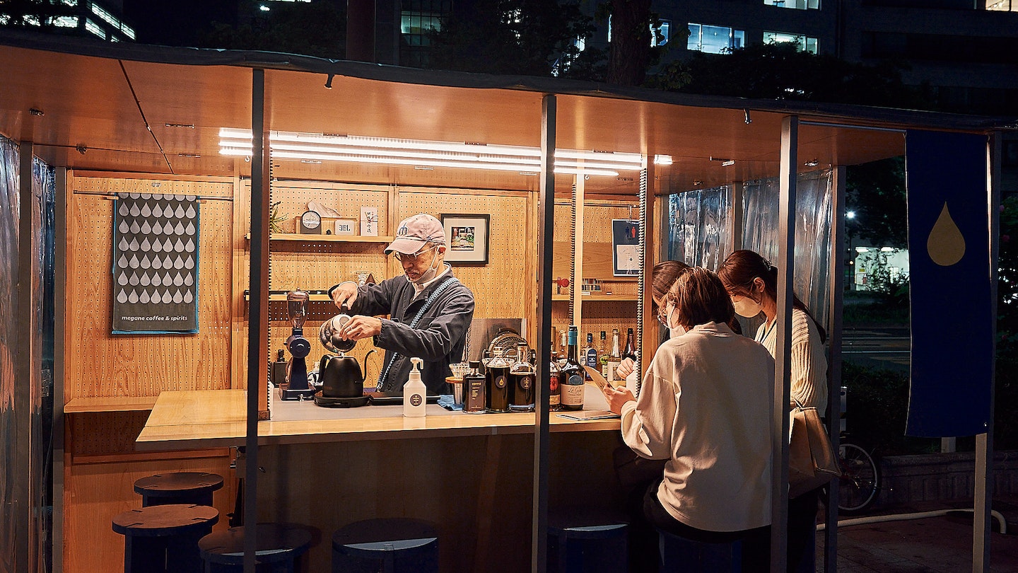 Refuel by the Megane Coffee & Spirits yatai between tastings © Darien Robertson/Lonely Planet