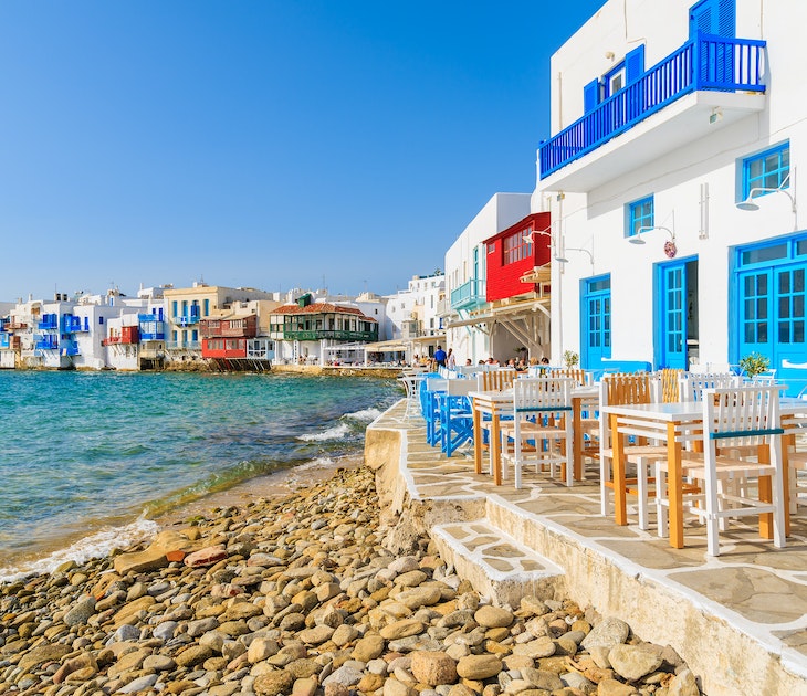 White tavern buildings on the coast in the Little Venice part of Mykonos Town.